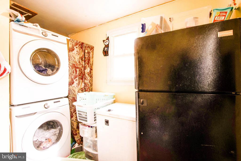 719 Wampler Road Baltimore, MD 21220 - Photo 17 of 18 a utility room with dryer and washer
