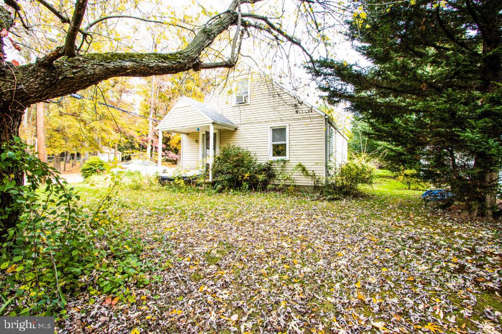 719 Wampler Road Baltimore, MD 21220 - Photo 2 of 18 a house with trees in front of it