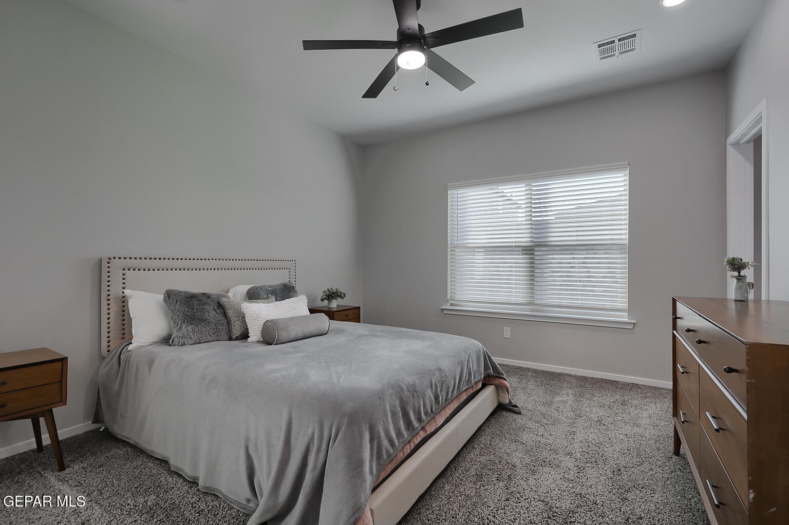 13896 Sky Ranger Avenue El Paso, TX 79928 - Photo 17 of 30 a bedroom with two beds and painting on the wall