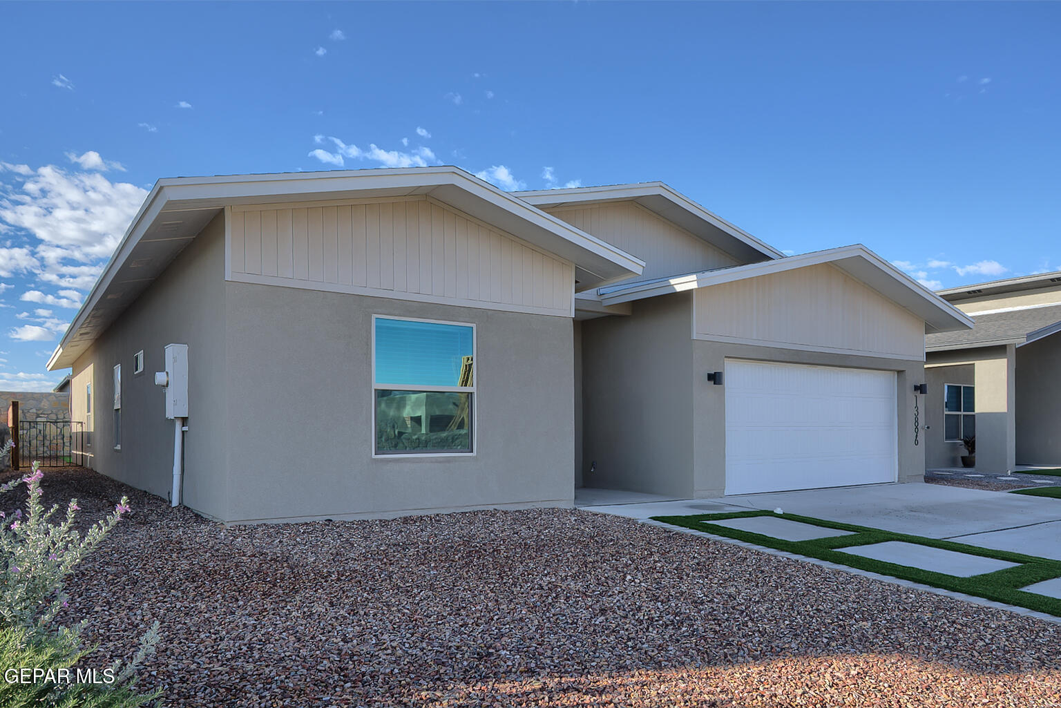 13896 Sky Ranger Avenue El Paso, TX 79928 - Photo 2 of 30 a backyard of a house