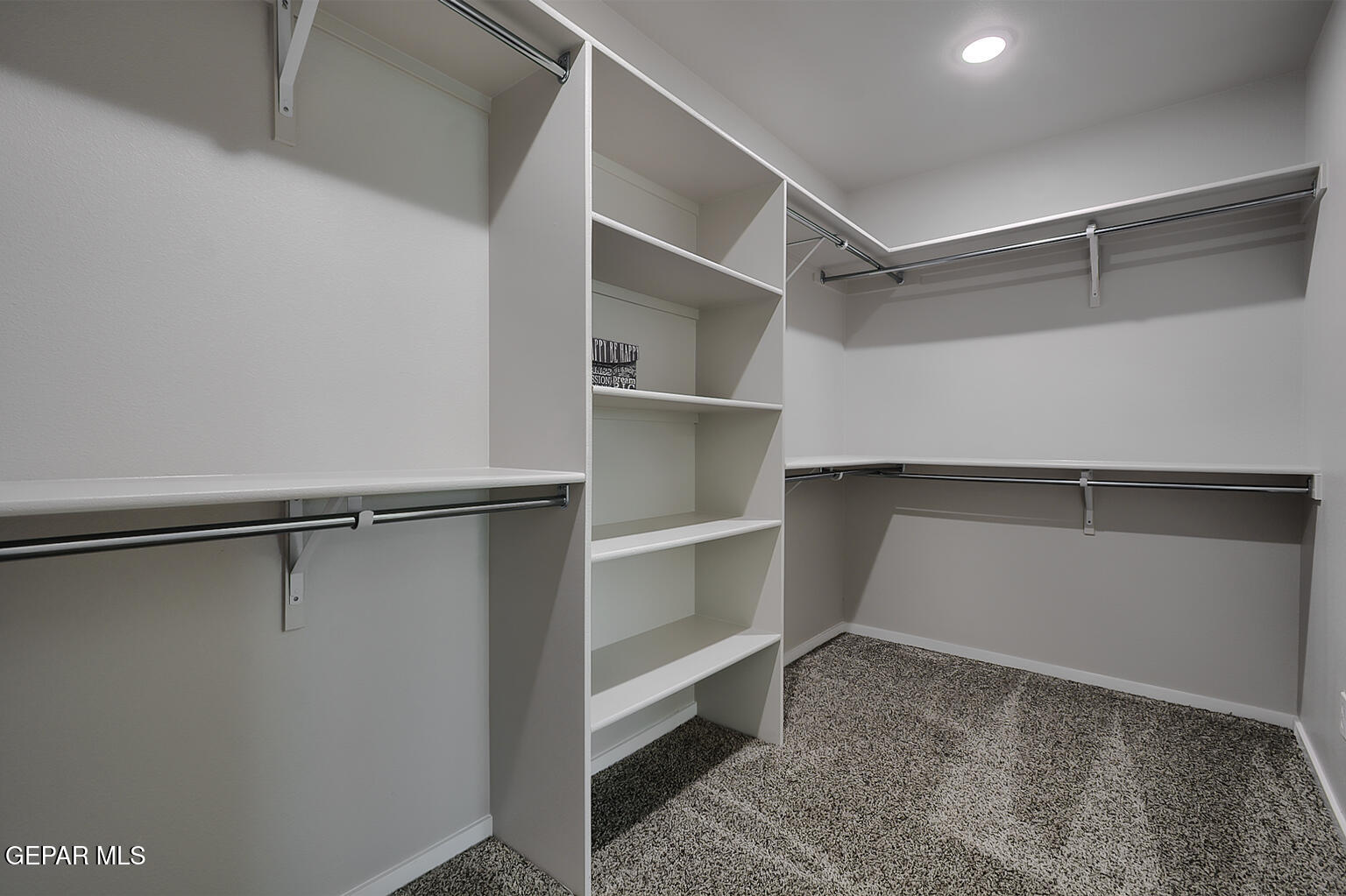 13896 Sky Ranger Avenue El Paso, TX 79928 - Photo 21 of 30 a view of an empty walk in closet