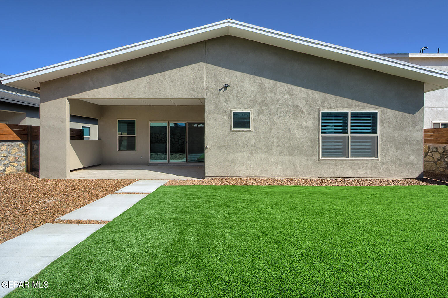 13896 Sky Ranger Avenue El Paso, TX 79928 - Photo 27 of 30 a front view of a house with garden