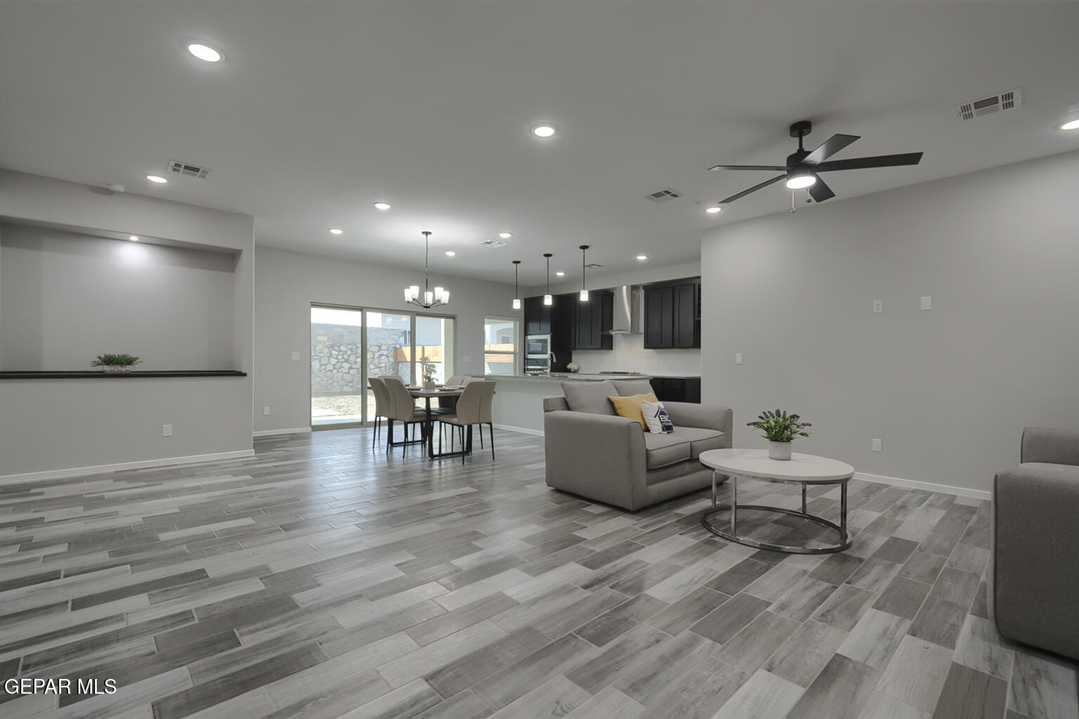 13896 Sky Ranger Avenue El Paso, TX 79928 - Photo 30 of 30 a view of a living room and dining room