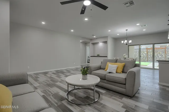 a view of a living room and dining room