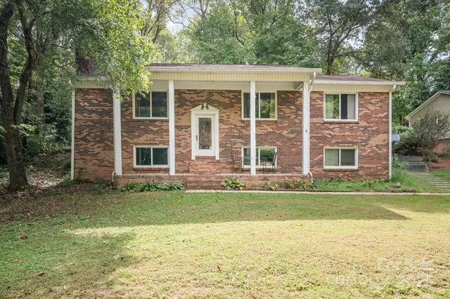 a view of a house with a swimming pool