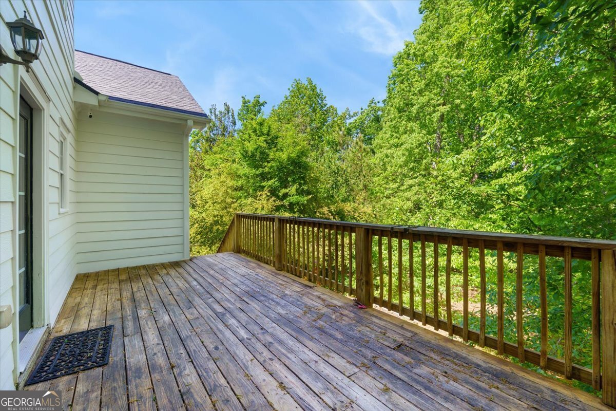 728 Markhams Drive Madison, GA 30650 - Photo 12 of 51 a view of balcony with wooden floor