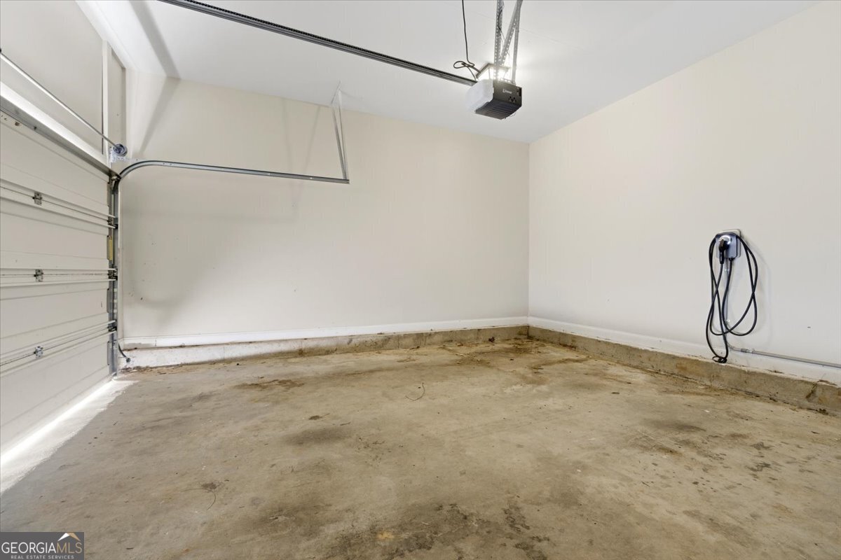728 Markhams Drive Madison, GA 30650 - Photo 14 of 51 a room with an empty space