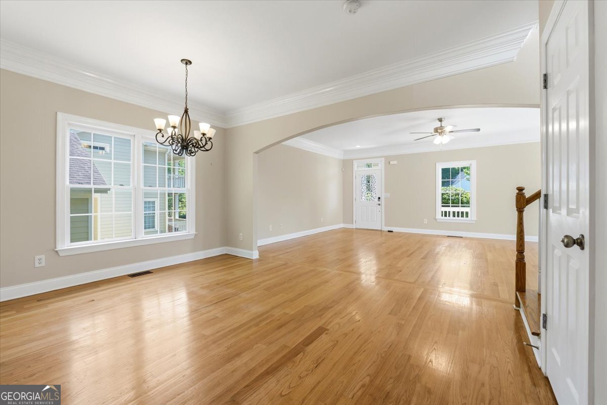 728 Markhams Drive Madison, GA 30650 - Photo 15 of 51 a view of livingroom with hardwood floor and window