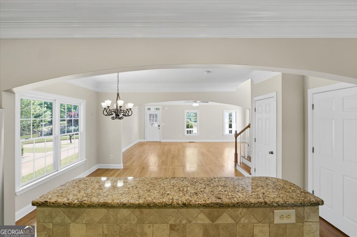 728 Markhams Drive Madison, GA 30650 - Photo 18 of 51 a view of kitchen and kitchen island