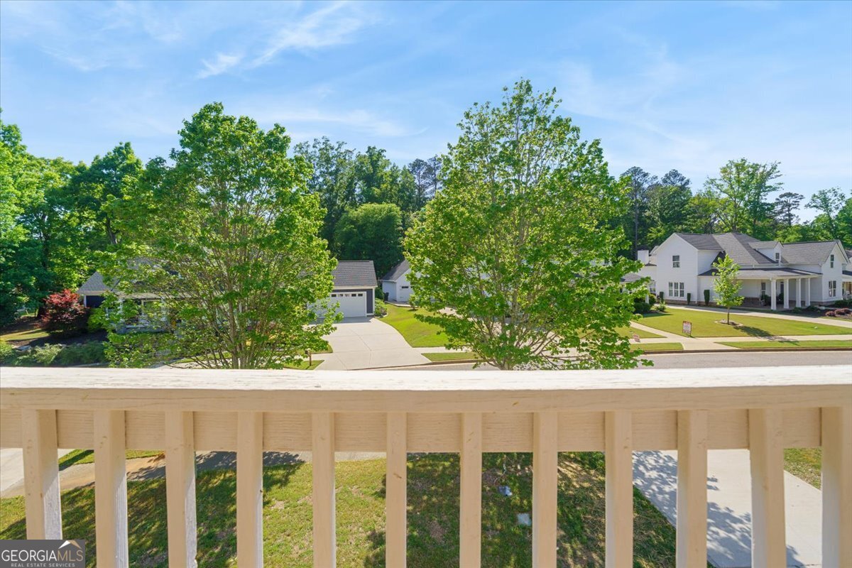 728 Markhams Drive Madison, GA 30650 - Photo 19 of 51 a view of a fence and trees in front of main door
