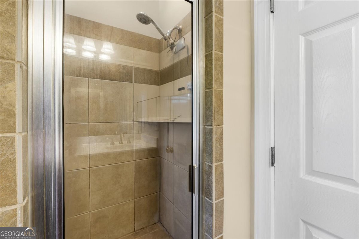 728 Markhams Drive Madison, GA 30650 - Photo 25 of 51 a bathroom with a shower