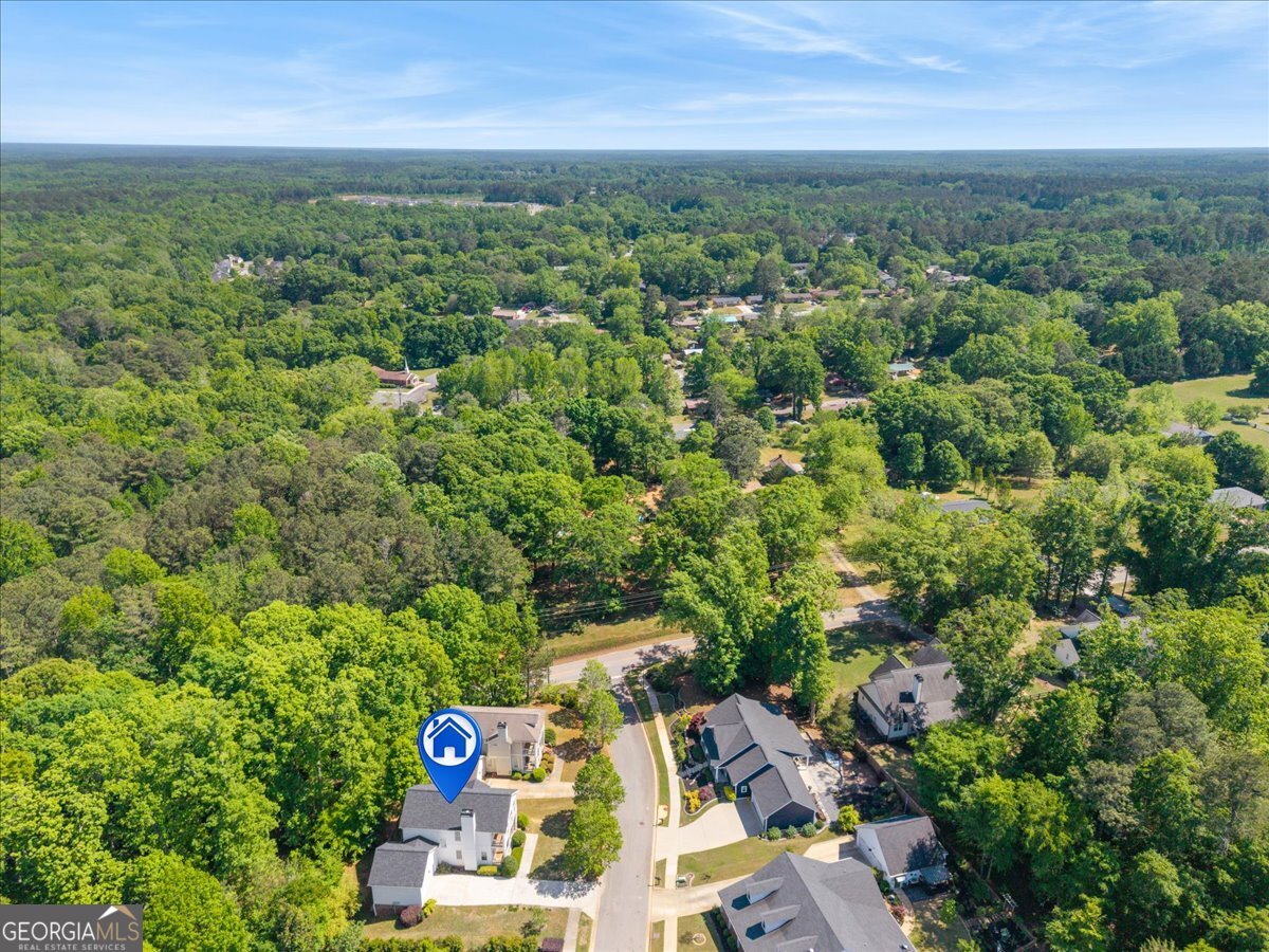 728 Markhams Drive Madison, GA 30650 - Photo 45 of 51 an aerial view of a city with lots of residential buildings