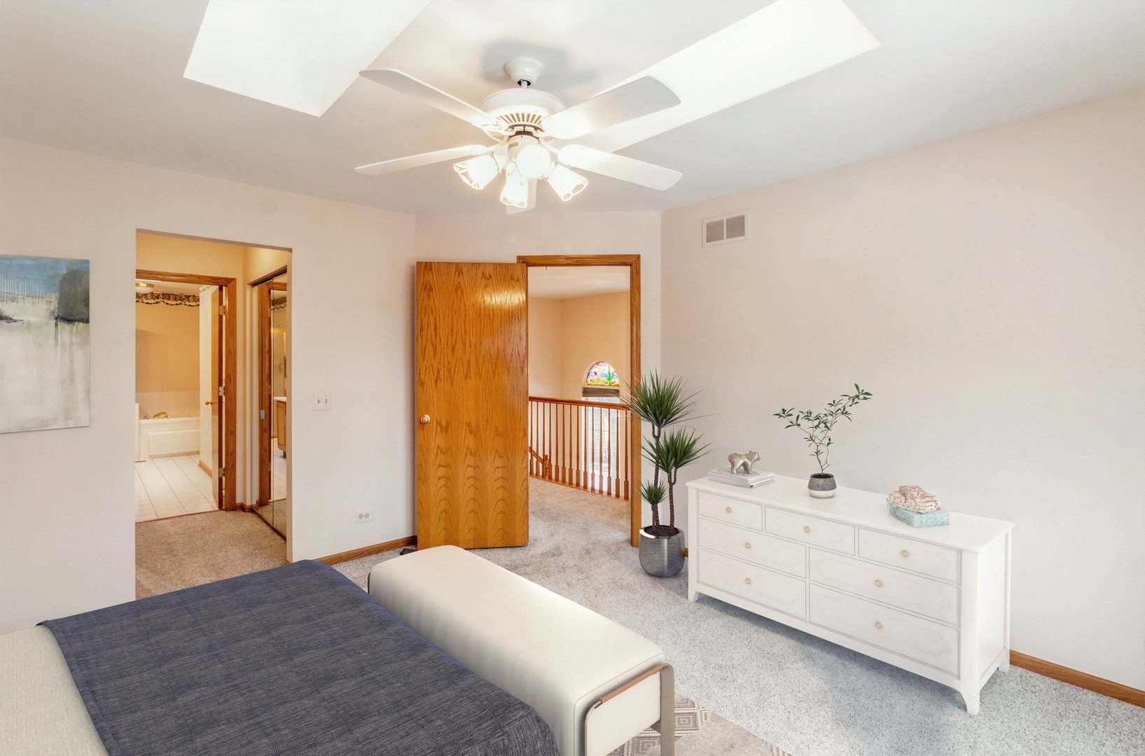 1200 Coldspring Road Elgin, IL 60120 - Photo 17 of 30 a spacious bedroom with a bed and ceiling fan