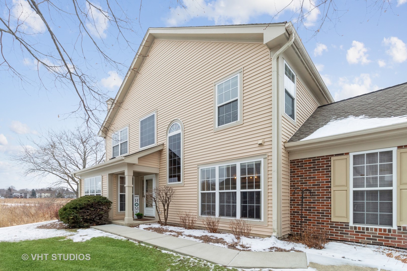 1200 Coldspring Road Elgin, IL 60120 - Photo 2 of 30 a view of a house with a yard and large tree
