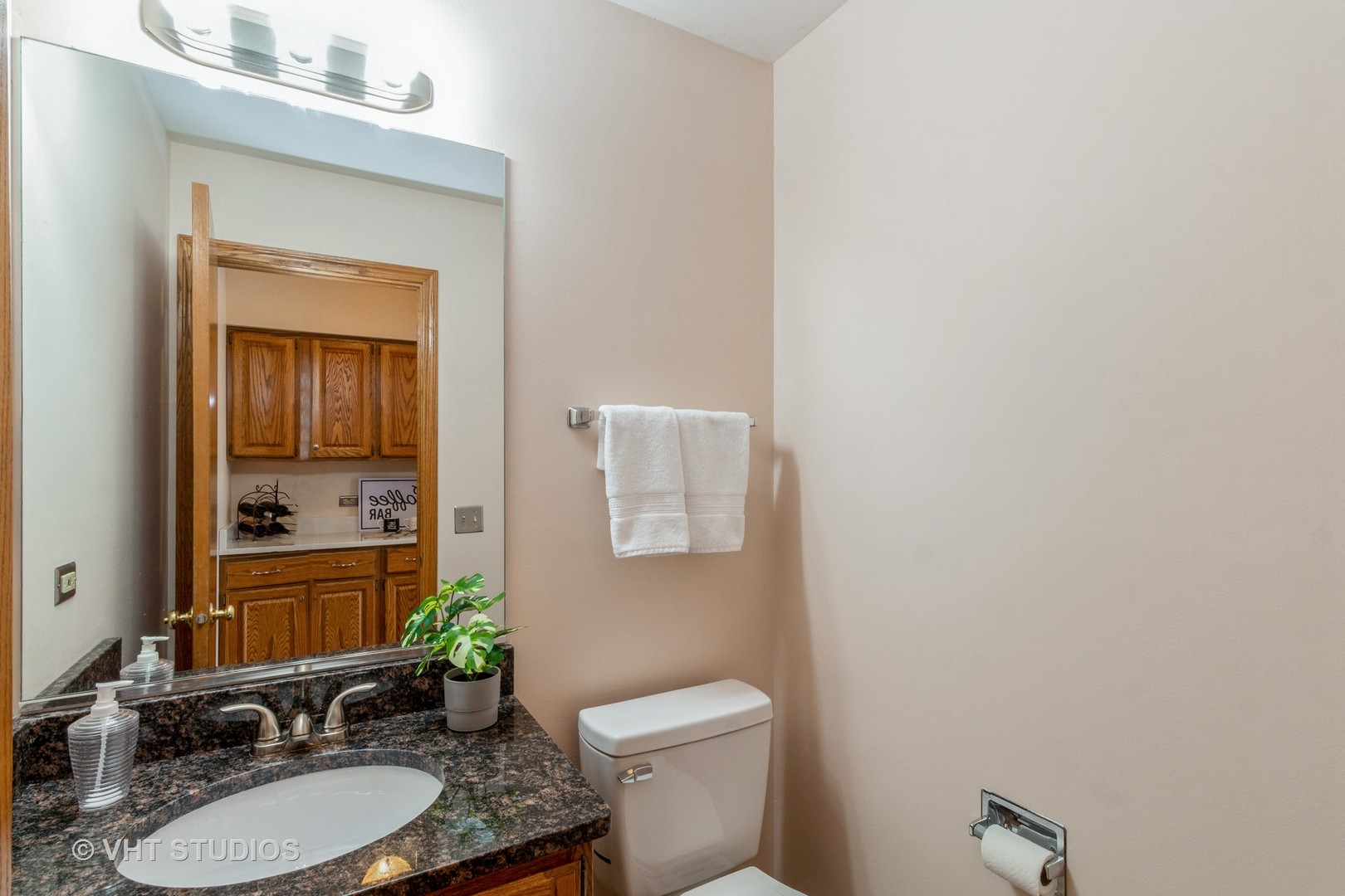 1200 Coldspring Road Elgin, IL 60120 - Photo 26 of 30 a bathroom with a granite countertop sink vanity mirror and toilet