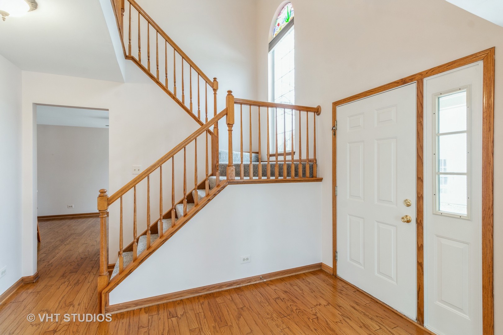 1200 Coldspring Road Elgin, IL 60120 - Photo 3 of 30 a view of an entryway with wooden floor