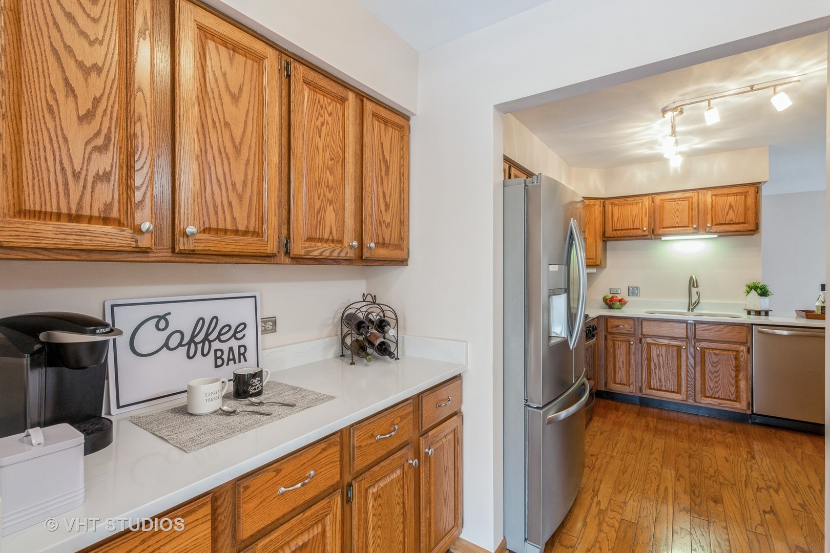 1200 Coldspring Road Elgin, IL 60120 - Photo 8 of 30 a kitchen with stainless steel appliances granite countertop a sink stove and cabinets