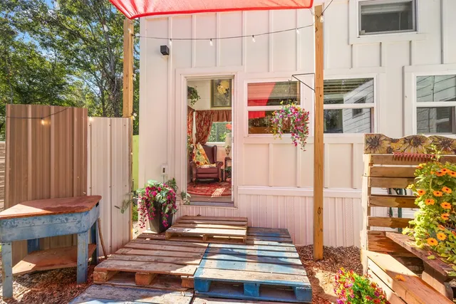 an aerial view of residential house with outdoor space and swimming pool