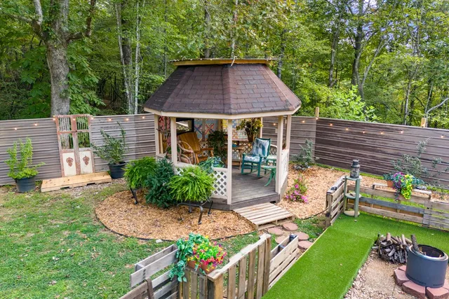 a house with trees in the background
