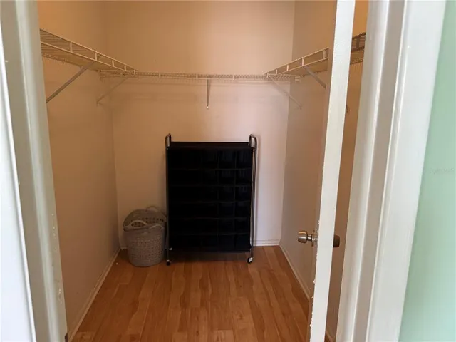 a view of an empty walk in closet