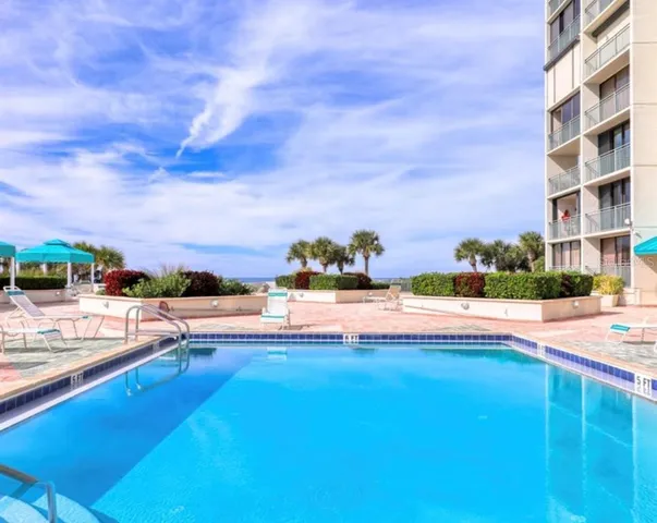 a view of lake with outdoor seating