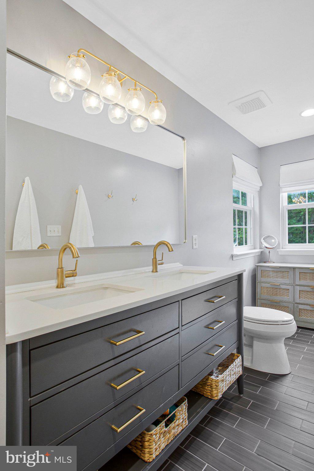 1582 Snug Harbor Road Shady Side, MD 20764 - Photo 48 of 53 Sleek modern bathroom with elegant fixtures.