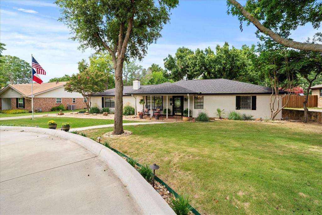 1117 Melissa Drive Keller, TX 76262 - Photo 1 of 1 a front view of a house with garden