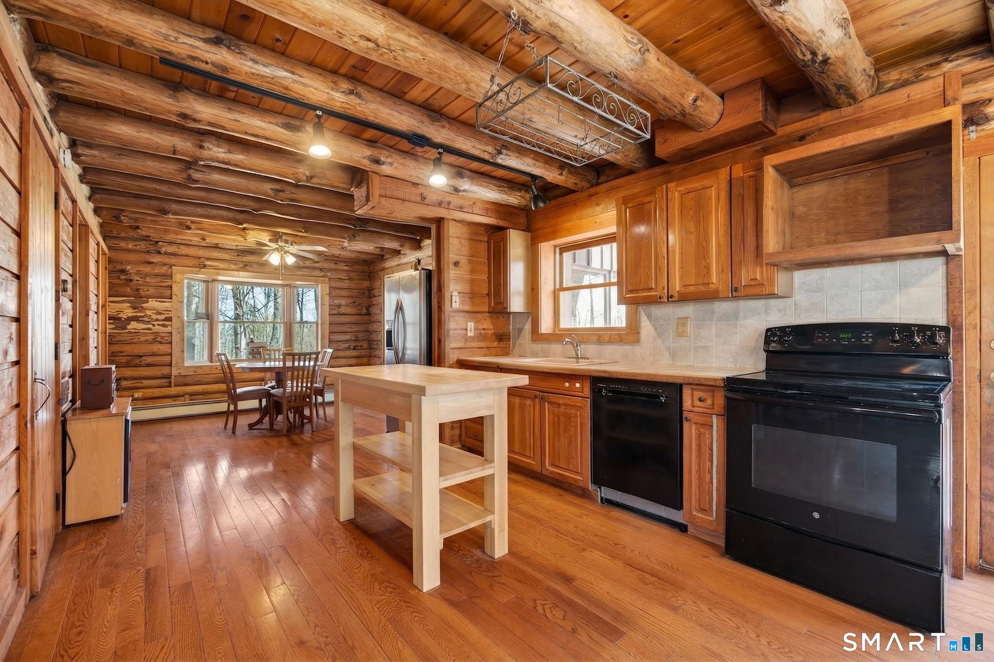 737 Shepard Avenue Hamden, CT 06514 - Photo 5 of 33 a kitchen with wooden floors and a stove