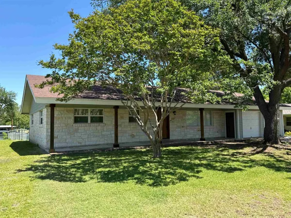 a front view of house with yard