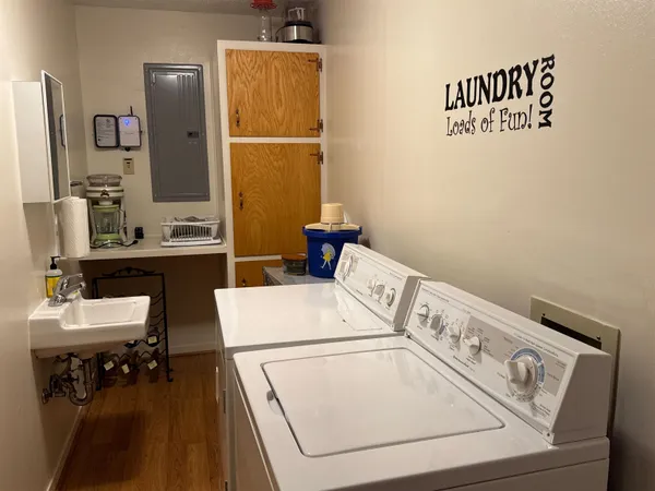 a utility room with dryer and washer
