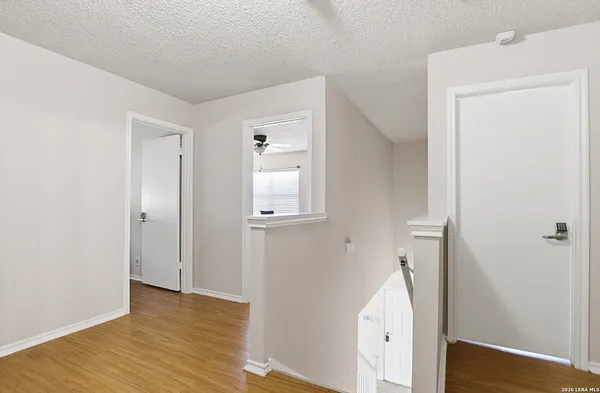 a view of entryway with wooden floor