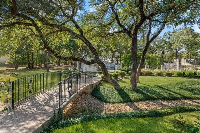 a view of a shaded area in a backyard