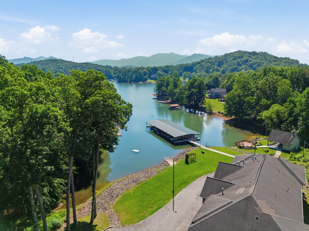 2143 Ridgecrest Circle, Unit 1 Hiawassee, GA 30546 - Photo 7 of 53 an aerial view of a house with a garden and lake view
