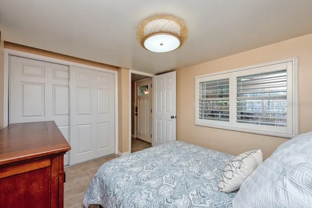a bathroom with a toilet sink and a mirror