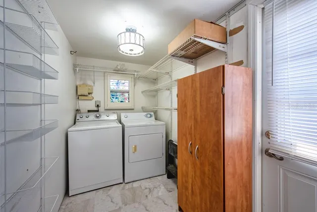 a view of empty room with windows