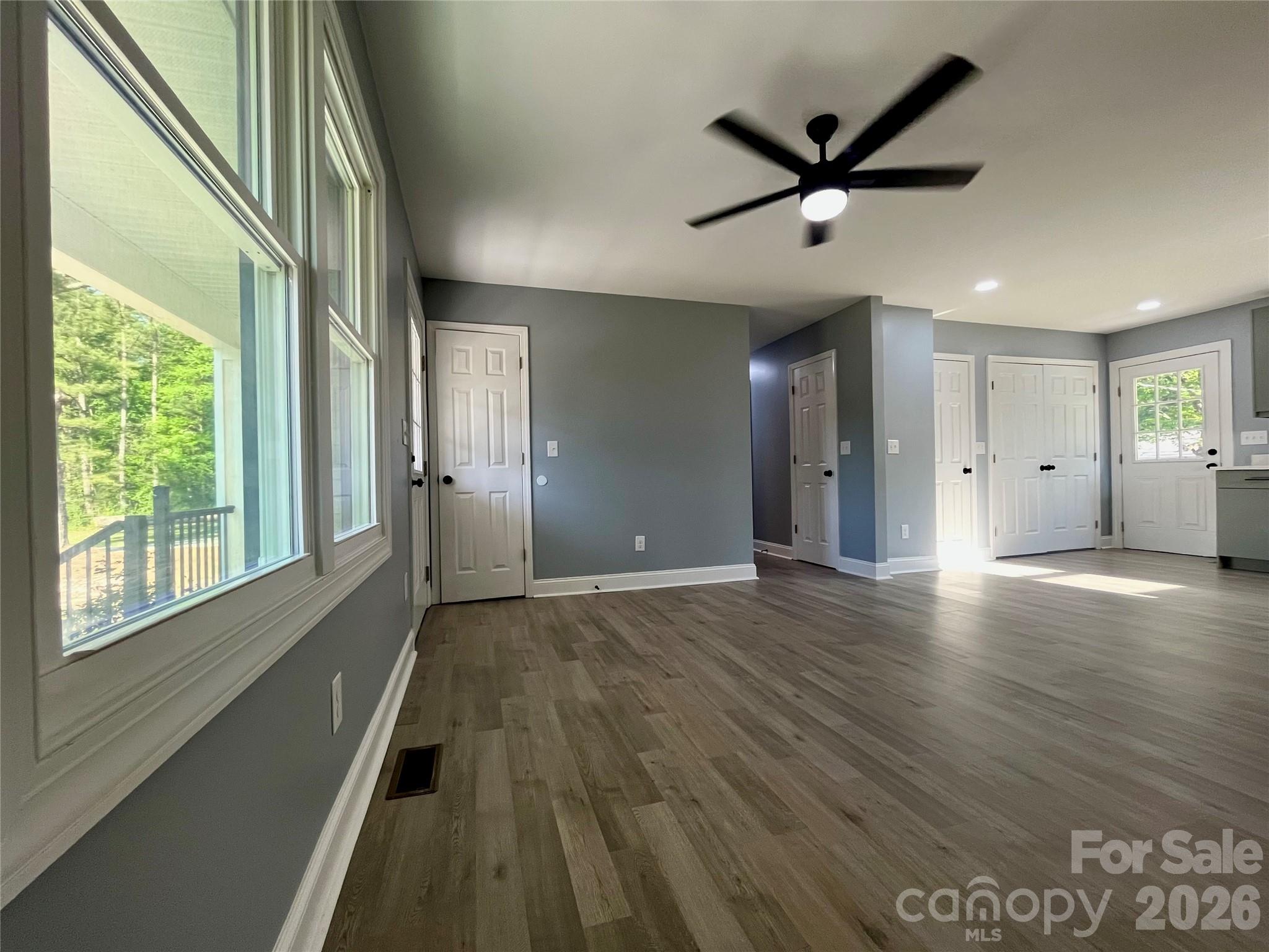 102 Arbor Court Chester, SC 29706 - Photo 11 of 42 a view of a livingroom with a ceiling fan and window
