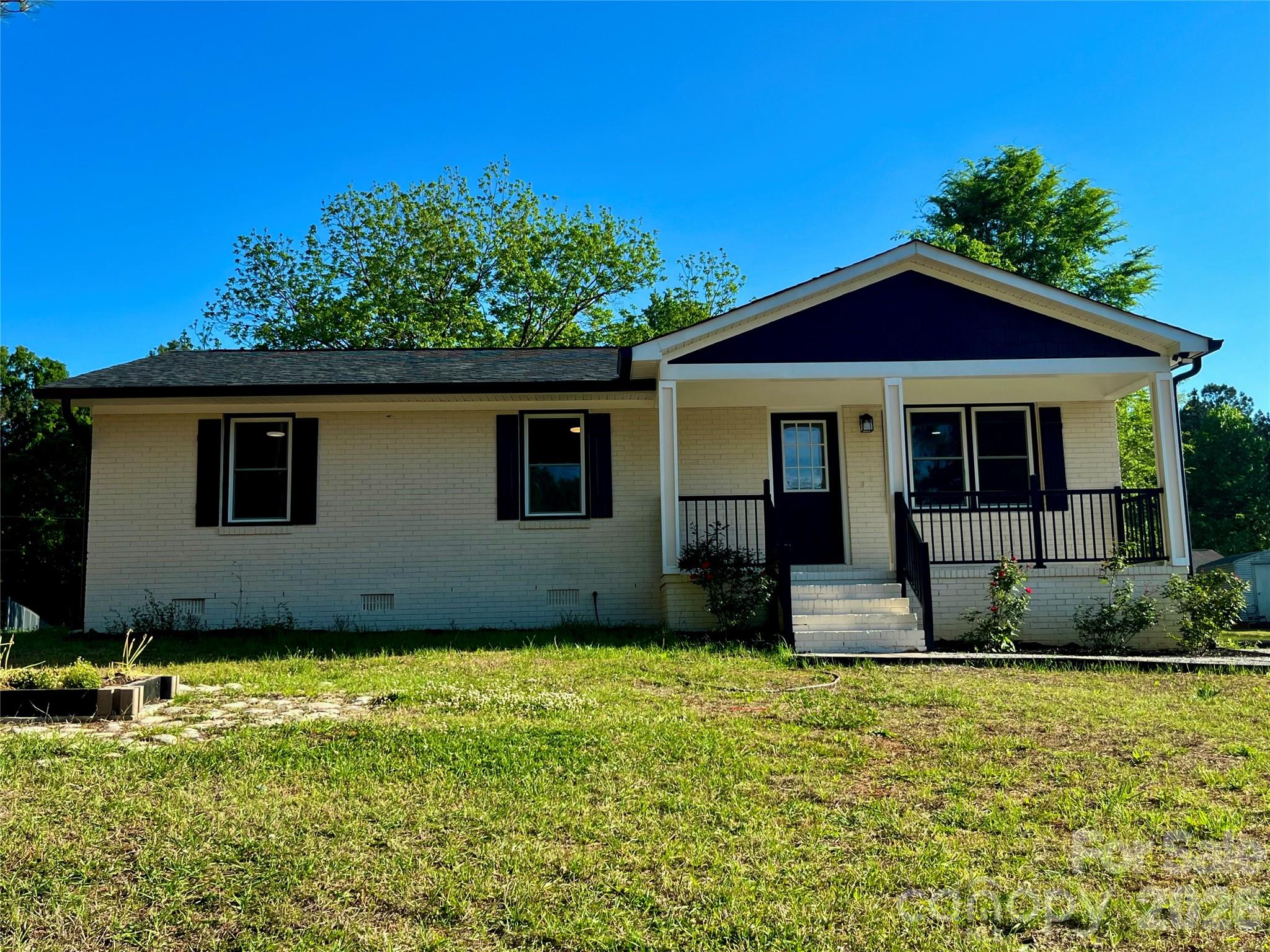 102 Arbor Court Chester, SC 29706 - Photo 2 of 42 a front view of a house with a garden