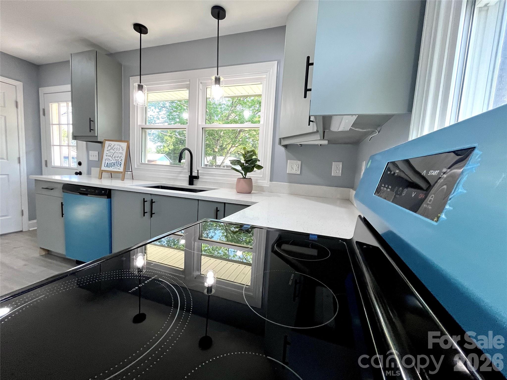 102 Arbor Court Chester, SC 29706 - Photo 21 of 42 a kitchen with a sink stove and cabinets