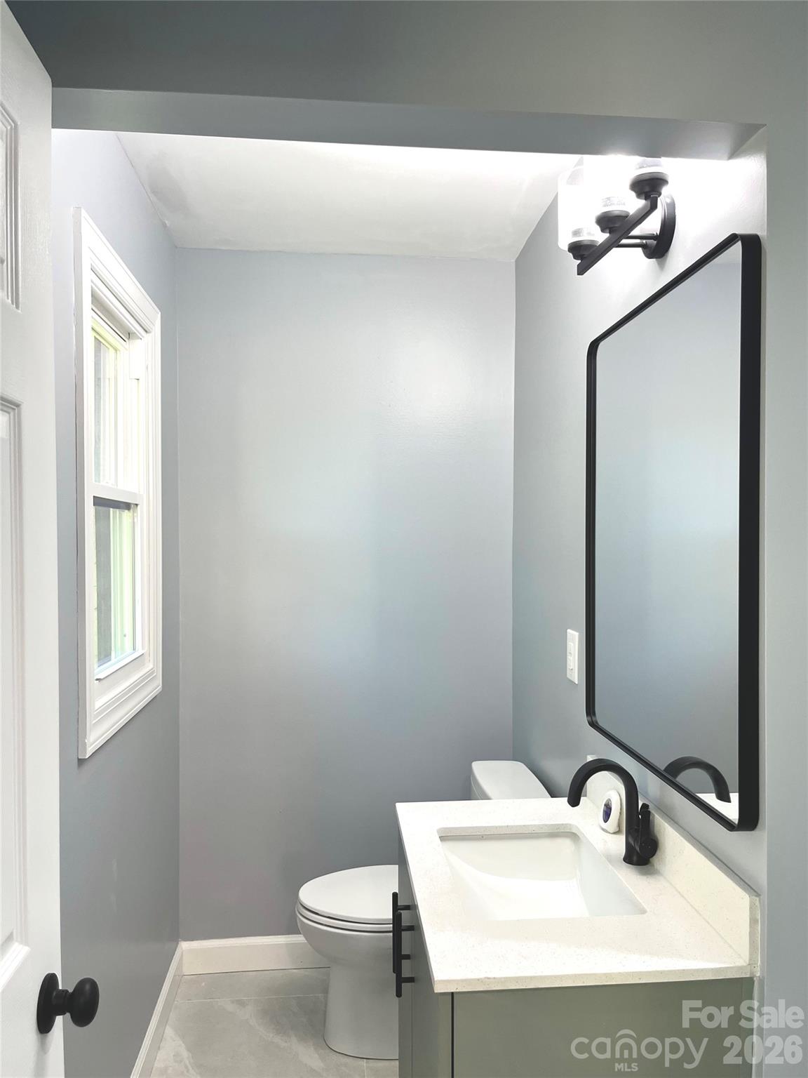 102 Arbor Court Chester, SC 29706 - Photo 34 of 42 a bathroom with a sink toilet and mirror