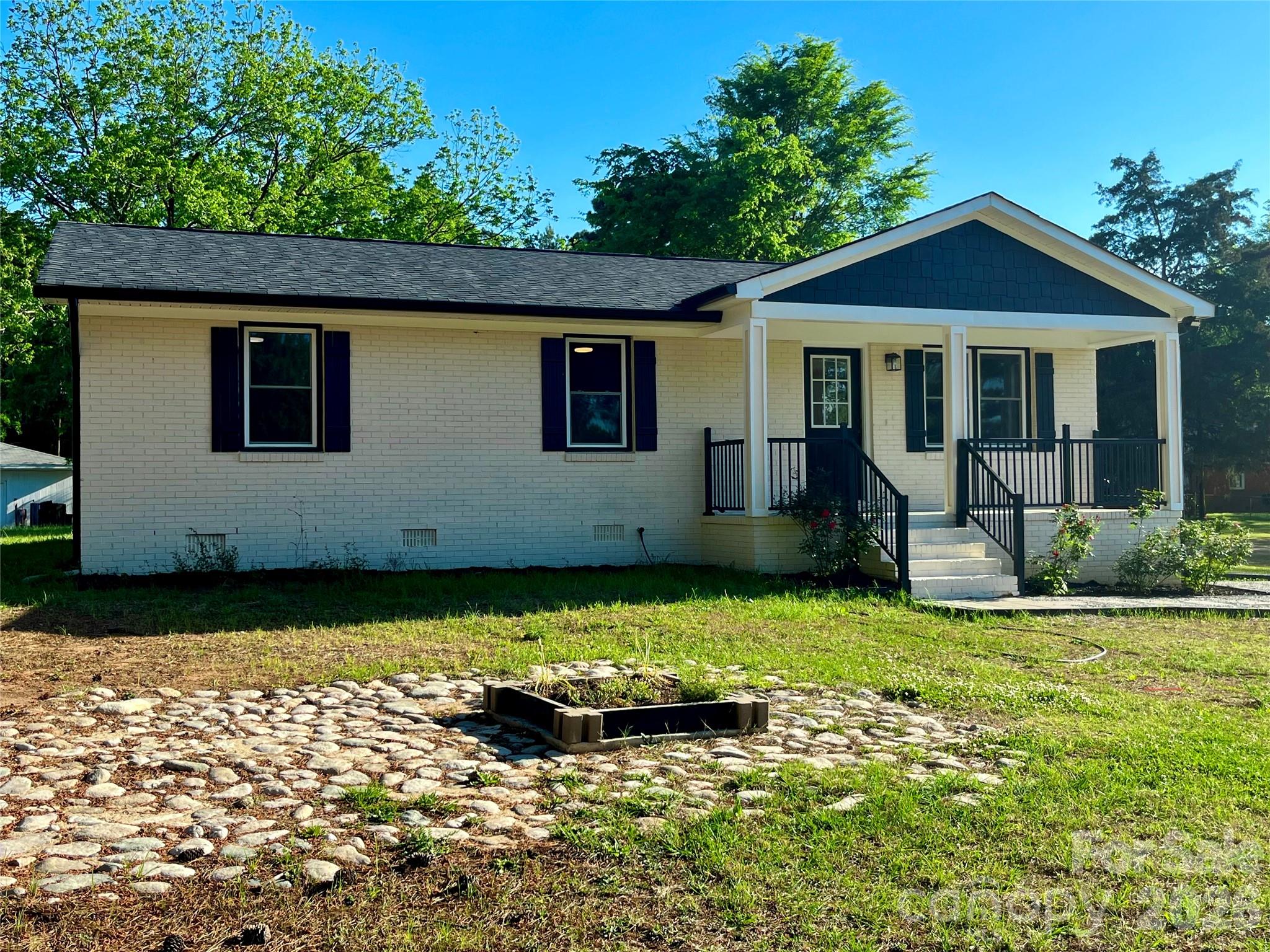 102 Arbor Court Chester, SC 29706 - Photo 4 of 42 a front view of a house with a yard