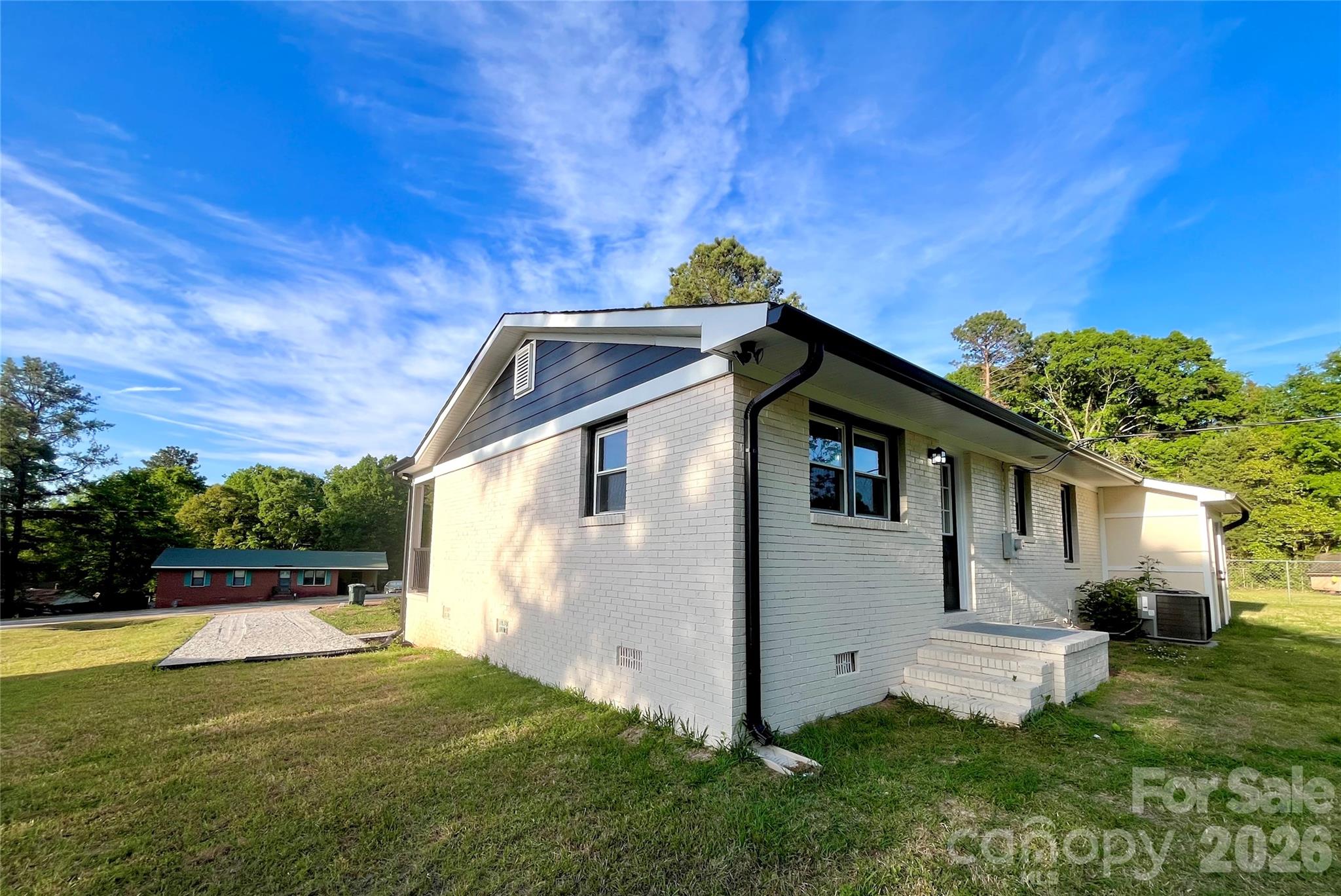 102 Arbor Court Chester, SC 29706 - Photo 41 of 42 a front view of a house with a yard