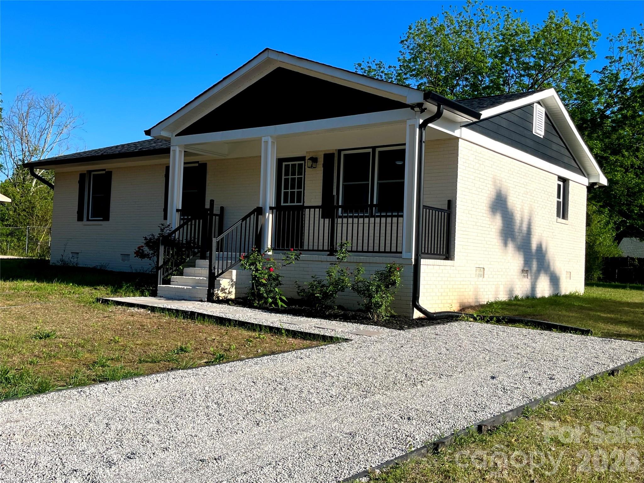 102 Arbor Court Chester, SC 29706 - Photo 6 of 42 a front view of a house with garden