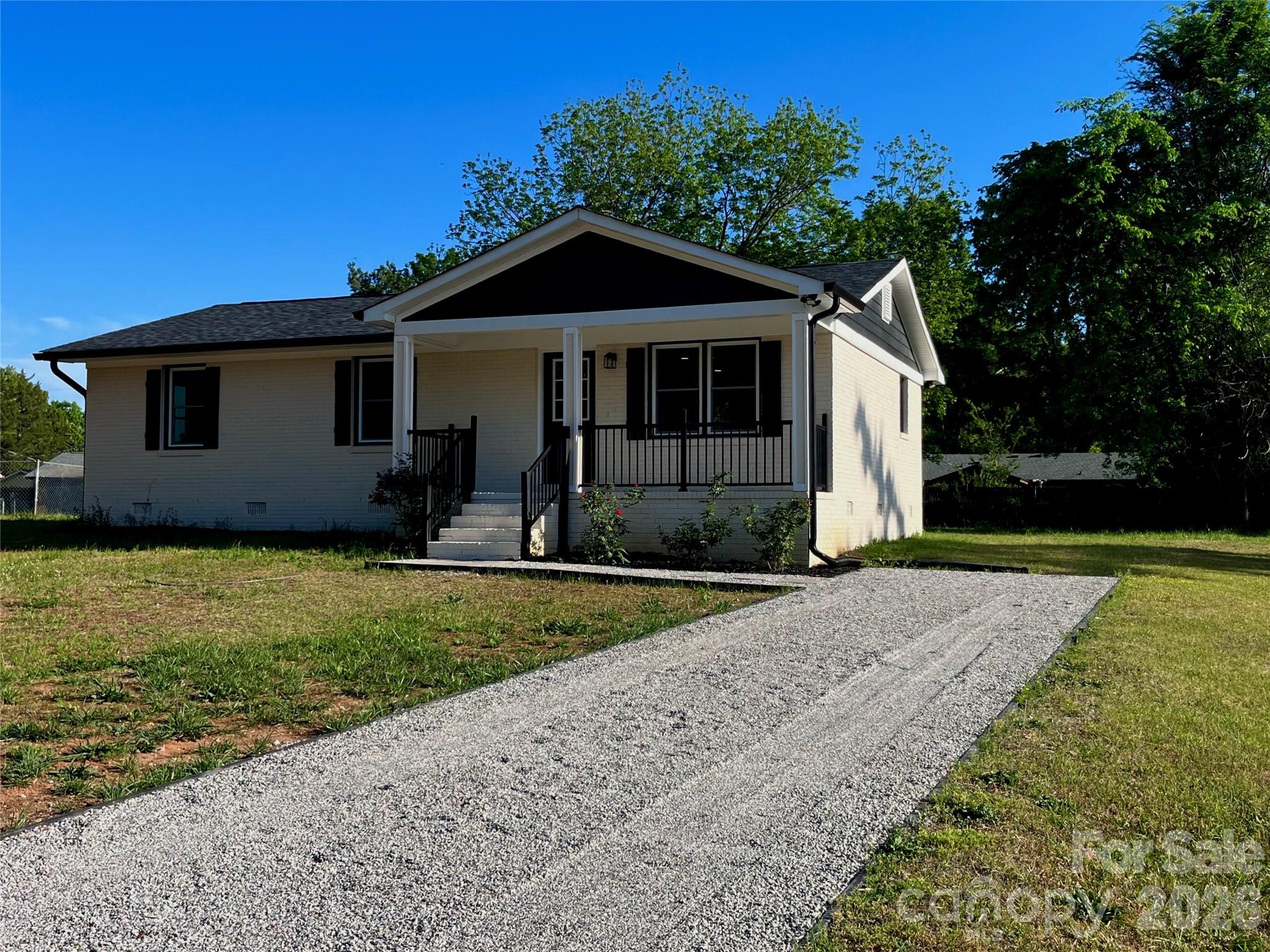 102 Arbor Court Chester, SC 29706 - Photo 8 of 42 a front view of a house with garden