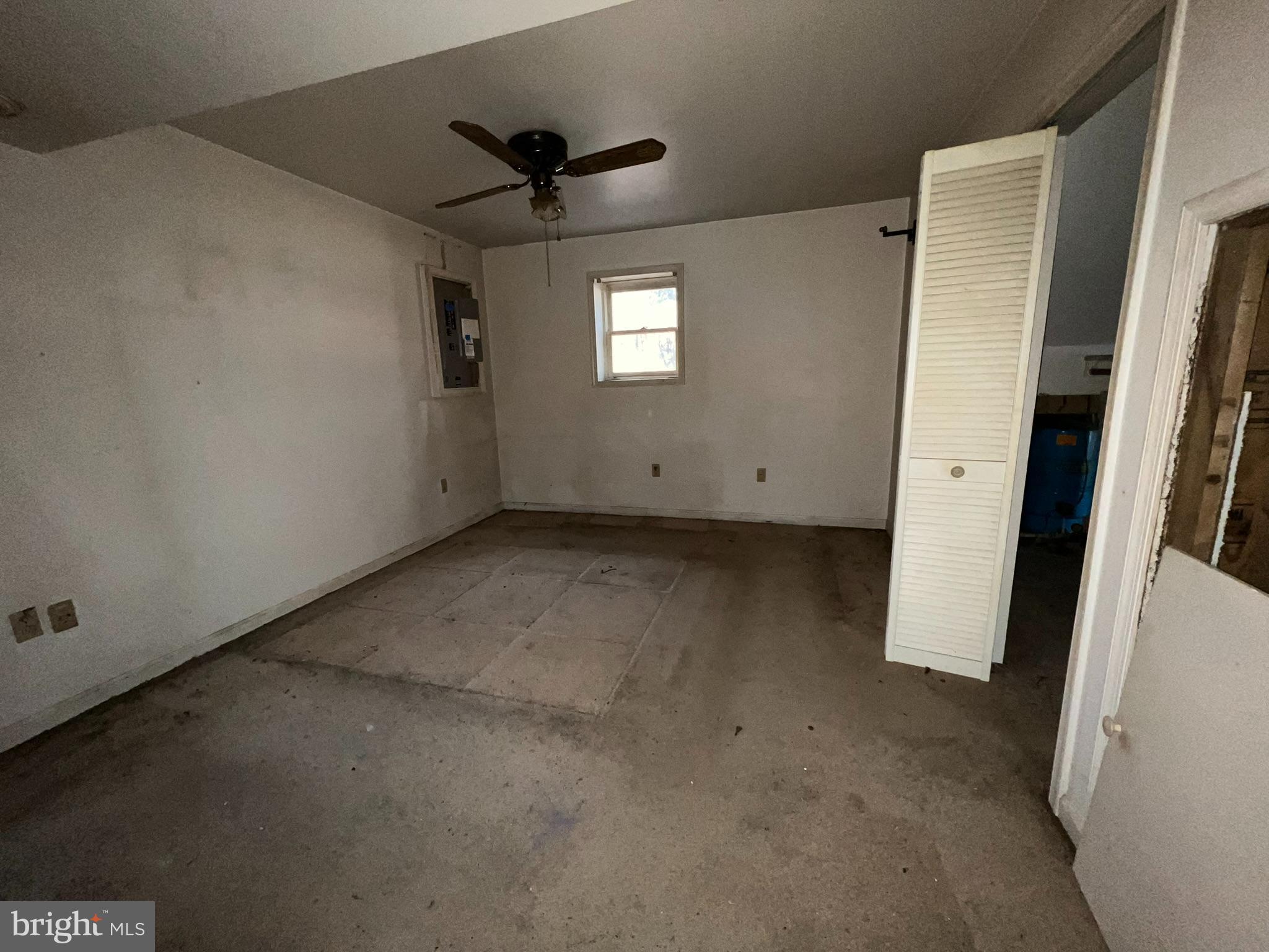 8520 Pine Boulevard Lusby, MD 20657 - Photo 4 of 13 an empty room with a window