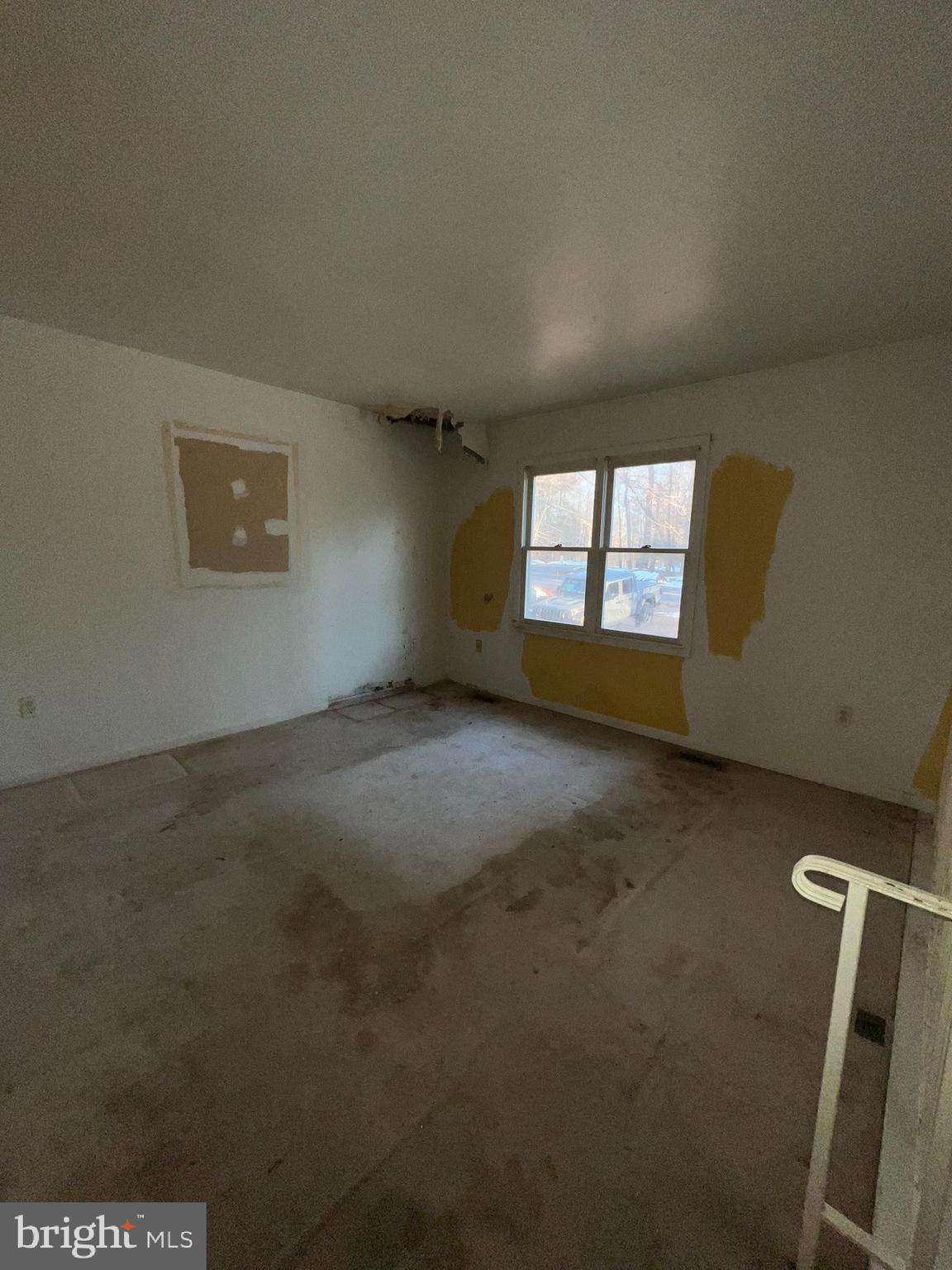 8520 Pine Boulevard Lusby, MD 20657 - Photo 8 of 13 an empty room with windows