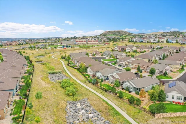 an aerial view of residential building and lake view
