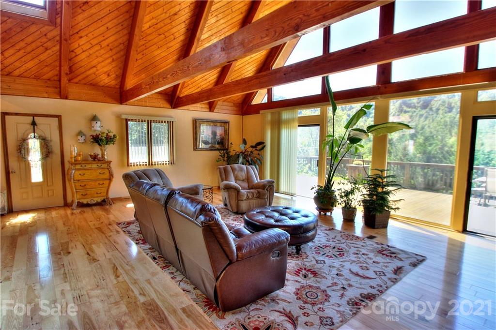 72 Slow Lane Canton, NC 28716 - Photo 4 of 47 a living room with furniture and a large window