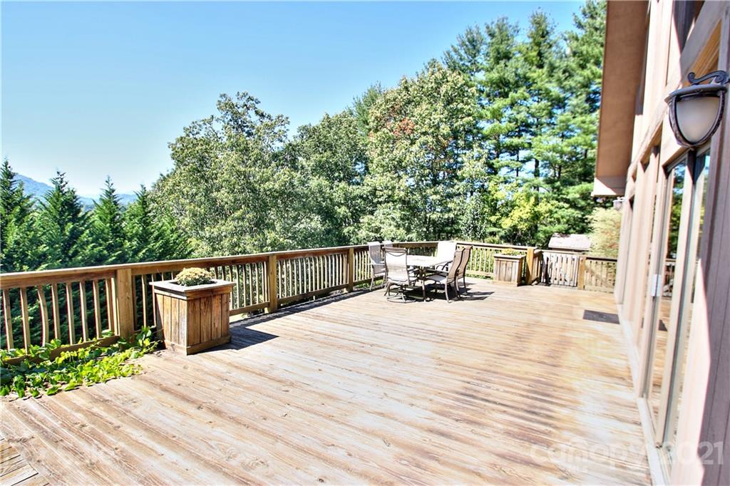 72 Slow Lane Canton, NC 28716 - Photo 34 of 47 a view of a deck with wooden floor and outer view