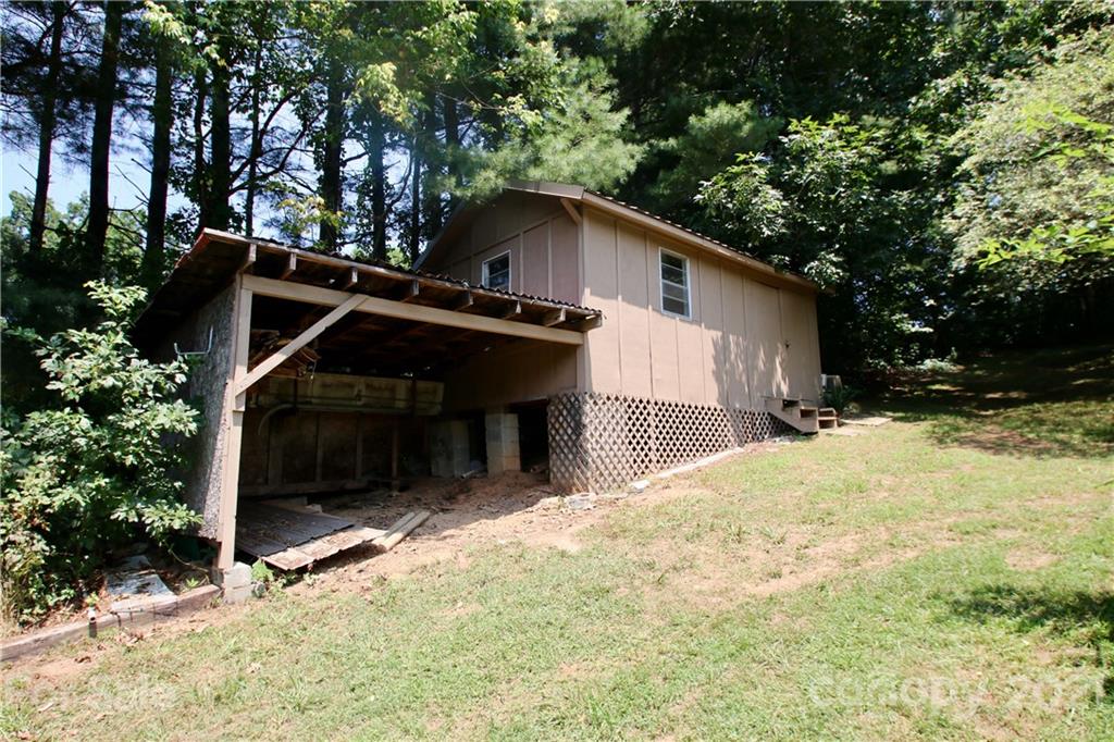 72 Slow Lane Canton, NC 28716 - Photo 39 of 47 a house with trees in the background