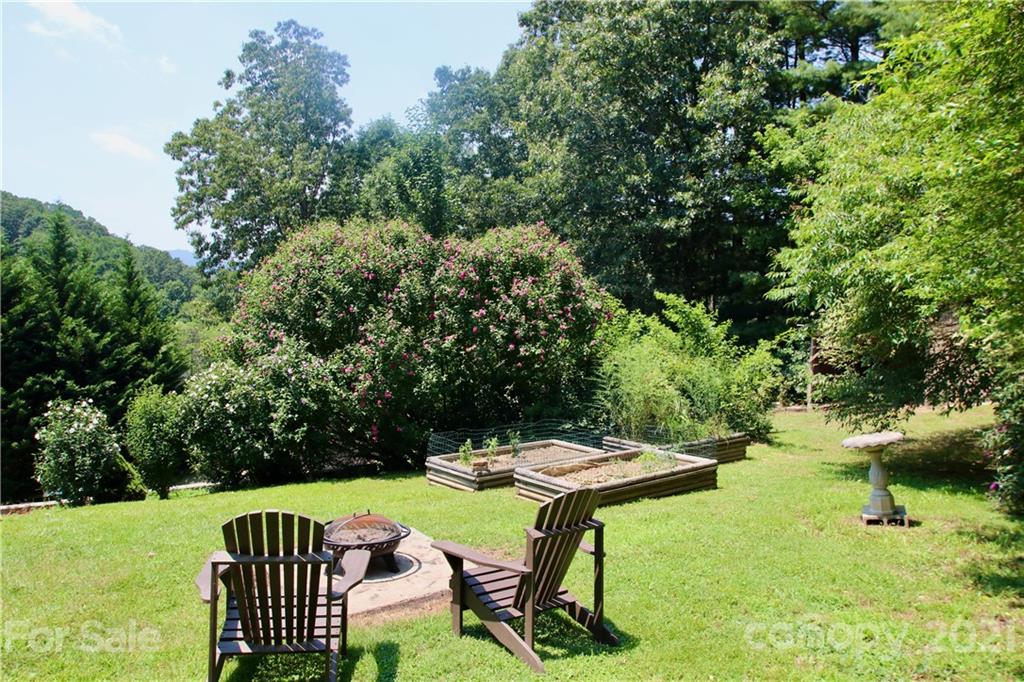 72 Slow Lane Canton, NC 28716 - Photo 42 of 47 a view of a chairs and table in the yard